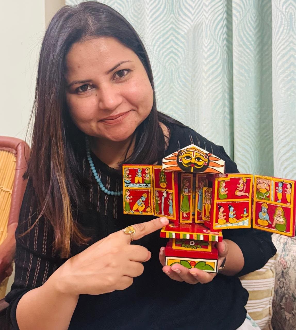 Tripti Pareek presenting a traditional painted Kavad storytelling shrine