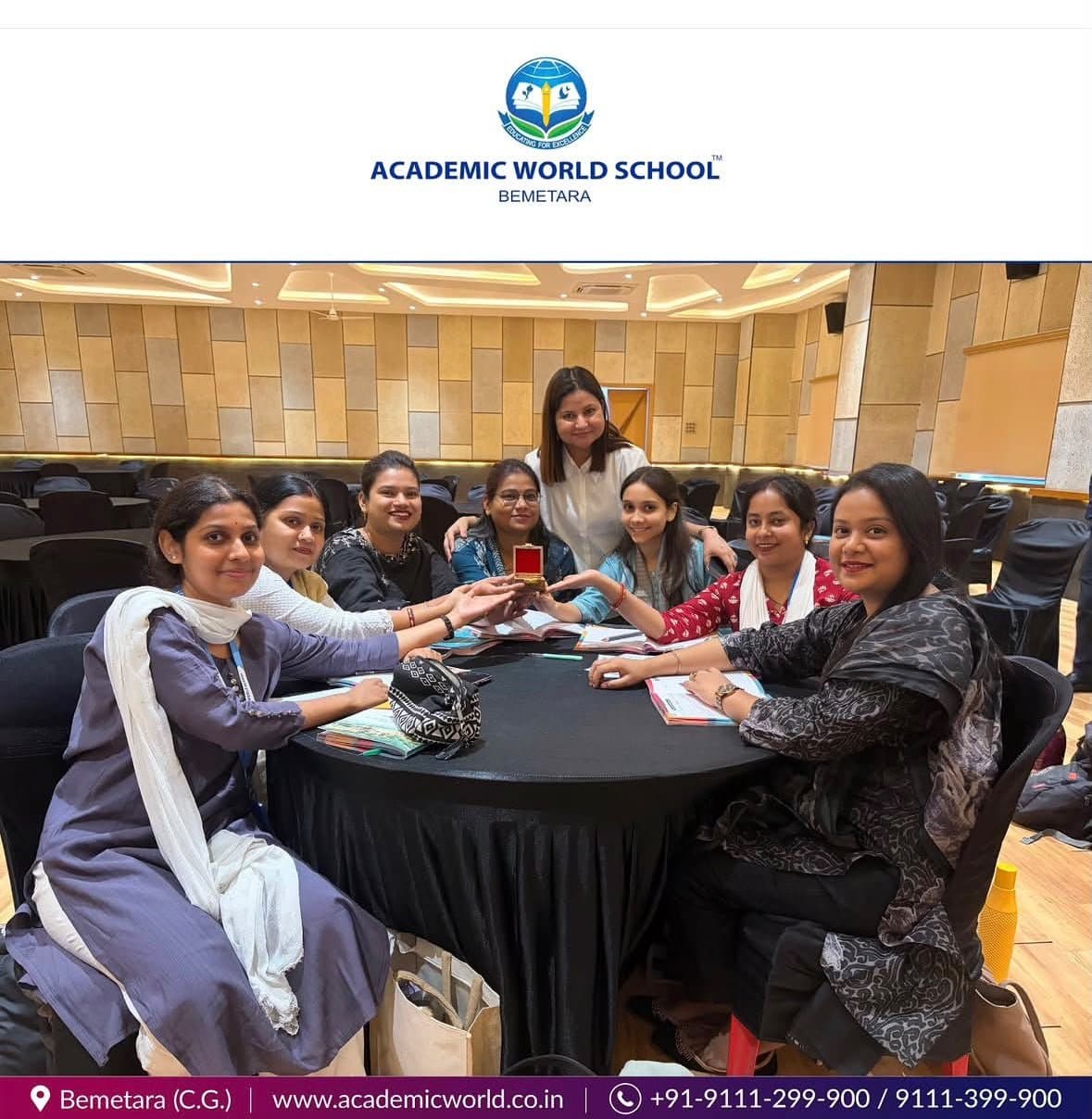 Educators celebrating together after a storytelling workshop at Academic World School