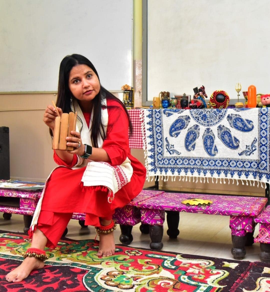 Seated performance with ghungroo and wooden percussion